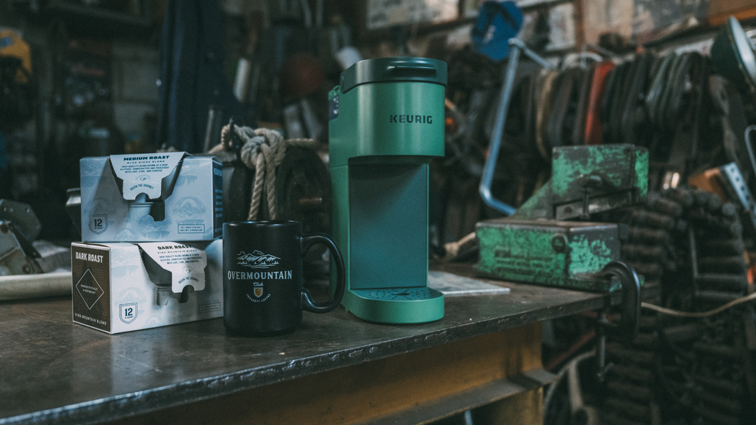 Crockett K Cup coffee in packaging next to a green Keurig.