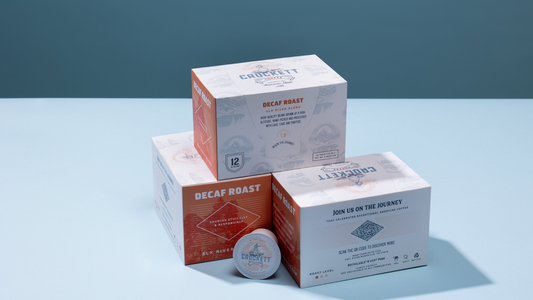 Crockett decaf K Cups in 12 pack boxes stacked.