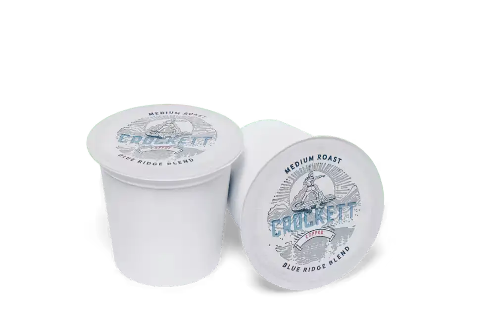 Medium roast coffee pods labeled “Blue Ridge Blend” with Crockett branding, displayed on a plain white background.