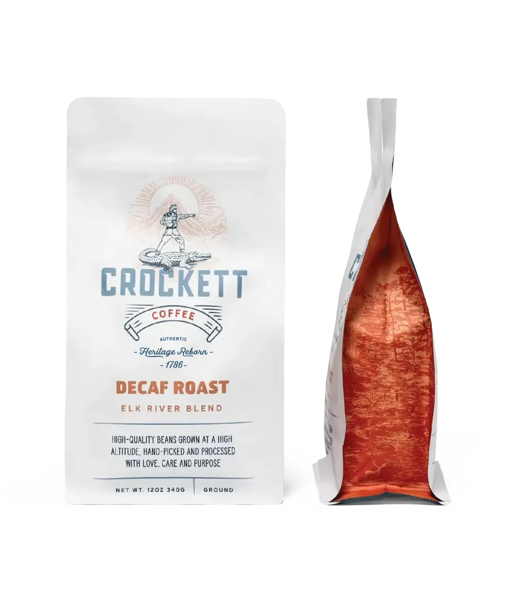 Decaf ground coffee in white Crockett Coffee packaging labeled Elk River Blend with high-quality, hand-picked beans.