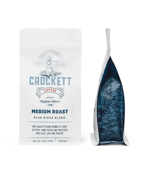 Medium roast ground coffee in Crockett Coffee's Blue Ridge Blend packaging made with high-altitude, hand-picked beans.