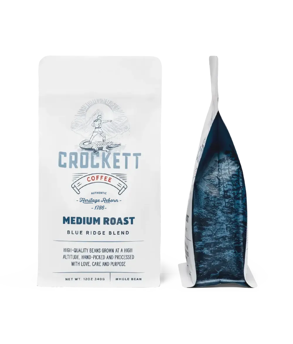 Whole bean medium roast coffee in Crockett Coffee's Blue Ridge Blend packaging made with high-altitude, hand-picked beans.