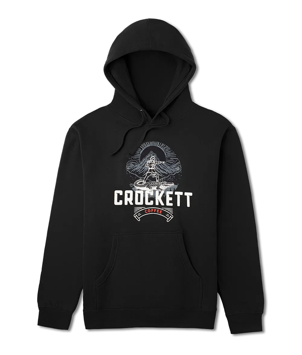 Black hoodie with front pocket featuring Crockett Coffee logo and mountain graphic printed on the chest.