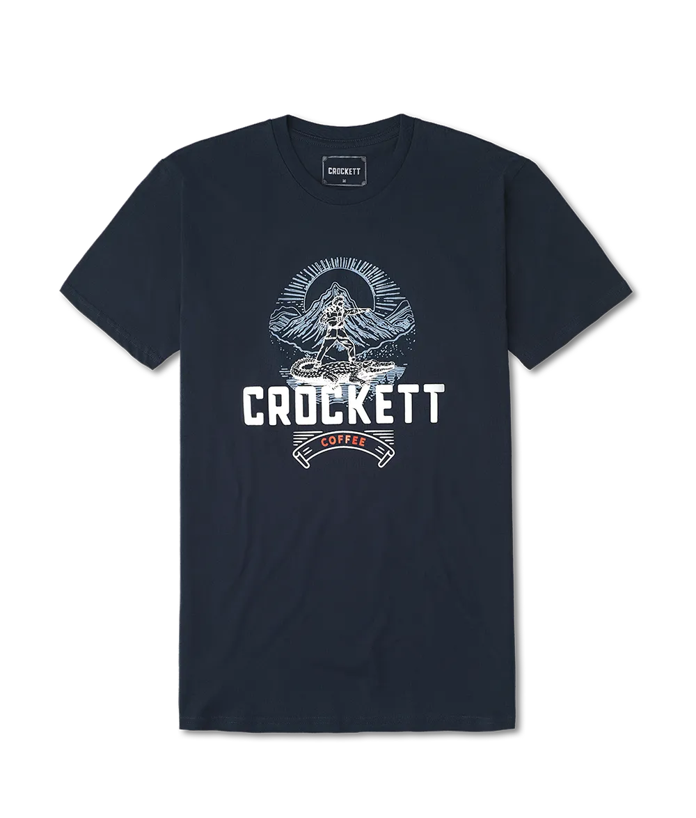Navy blue crew neck t-shirt featuring Crockett Coffee logo and mountain graphic printed on the front.