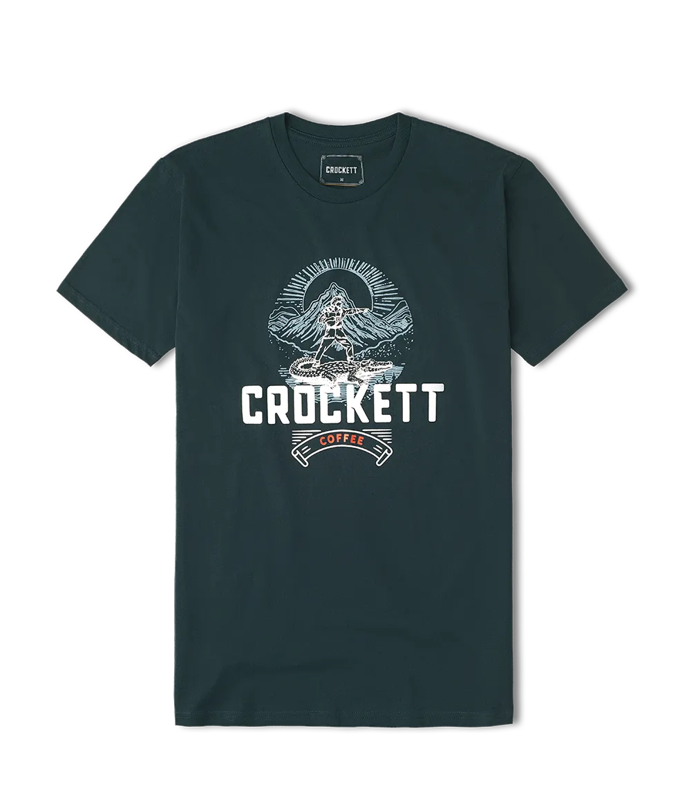 Crewneck t-shirt in dark green featuring a Crockett Coffee logo and mountain graphic printed on the front.