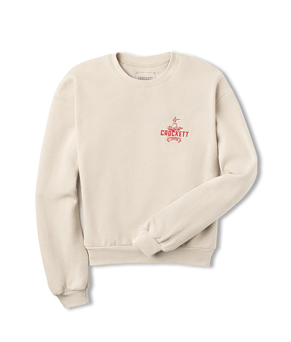 Off-white sweatshirt with red Crockett Coffee logo printed on the left chest and classic crewneck design.