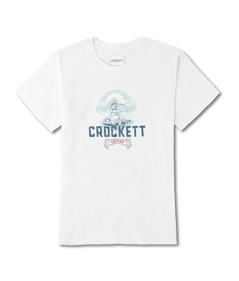 White crewneck shirt featuring a Crockett Coffee logo and mountain scene graphic printed on the front.